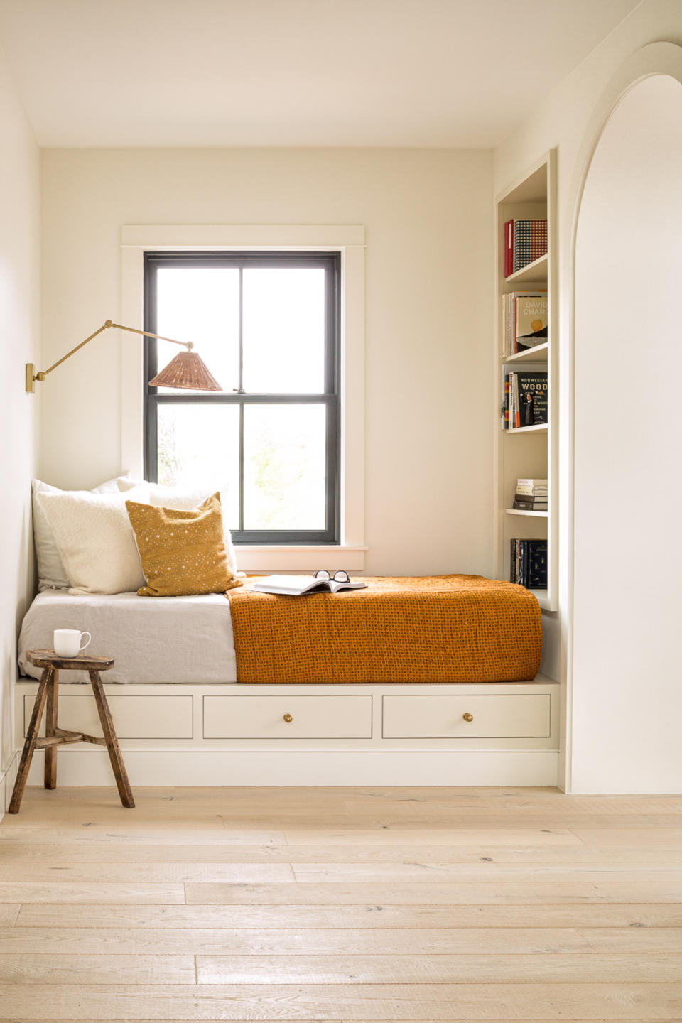 Bedroom with built-in drawers under bed