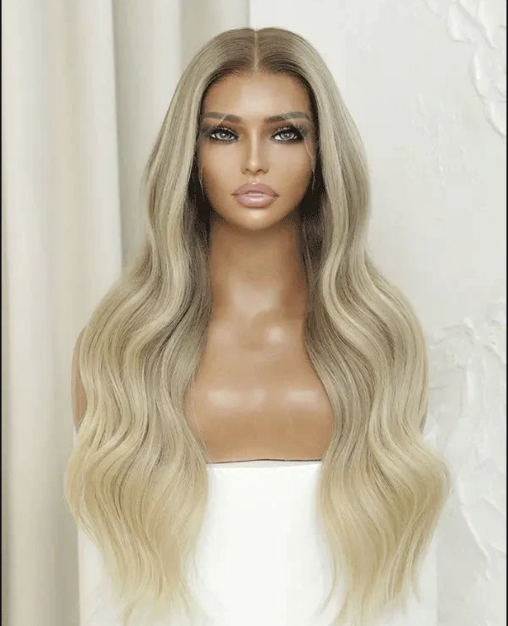 <p><a href="https://www.hairvivi.com/collections/all-hd-lace-front-wigs/products/vivian-blonde-wig-bleached-knots-and-plucked-hairline-160-density" rel="nofollow noopener" target="_blank" data-ylk="slk:Shop Now;elm:context_link;itc:0;sec:content-canvas" class="link rapid-noclick-resp">Shop Now</a></p><p>Vivian Blonde Transparent HD Wig</p><p>hairvivi.com</p><p>$565.00</p>