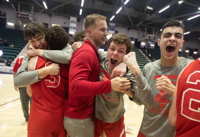Tappan Zee celebrates after defeating Irondequoit 49-36 to win the NYSPHSAA Class A basketball championship at the Cool Insuring Arena in Glens Falls March 17, 2023.