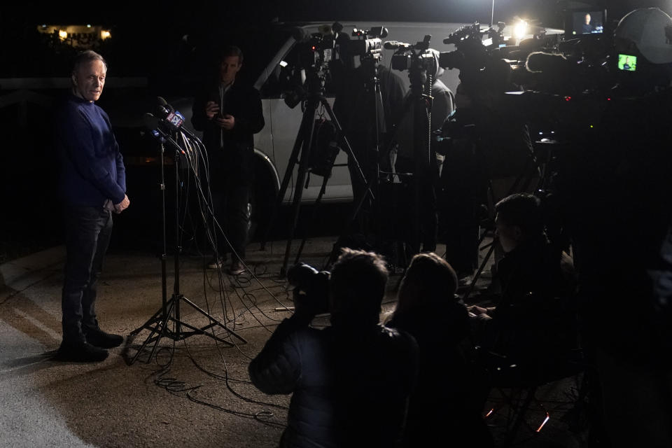 Uri Raanan, left, talks to reporters outside his Bannockburn, Ill., home after his daughter Natalie and her mother Judith Raanan were released by Hamas, Friday, Oct. 20, 2023. (AP Photo/Charles Rex Arbogast)