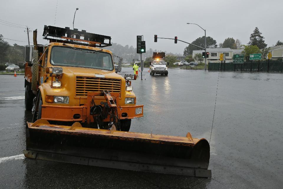 A Caltrans trucks blocks off a flooded roadway near U.S. Highway 101 Thursday, Dec. 15, 2016, in Mill Valley, Calif. One of the strongest rainstorms of the season hit the San Francisco Bay Area on Thursday, with a small town in the North Bay receiving nearly seven inches of rain over the last 24-hour period, forecasters said. Flash-flood warnings are in effect for southern Sonoma County and northern Marin County. (AP Photo/Eric Risberg)