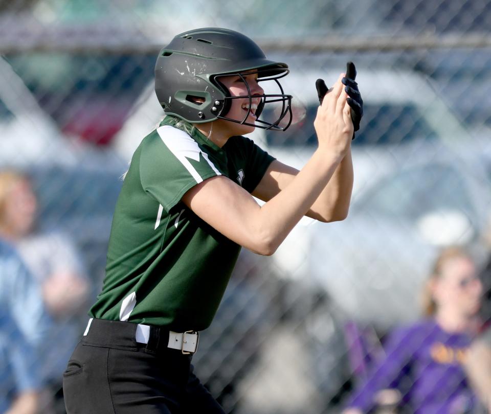 GlenOak's Ryleigh Hall cheers on her team after a score against Jackson.  Tuesday, April 4, 2023.