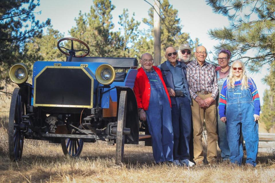 From left: Bob Grimm, Dave Grimm, Bob's son-in-law Fred Hilpert, Don Grimm, Bob's granddaughter Lori Hilpert and Bob's daughter Connie Hilpert are pictured with the 1907 International Harvester high-wheeler auto buggy that three generations of the Grimm family helped to complete.