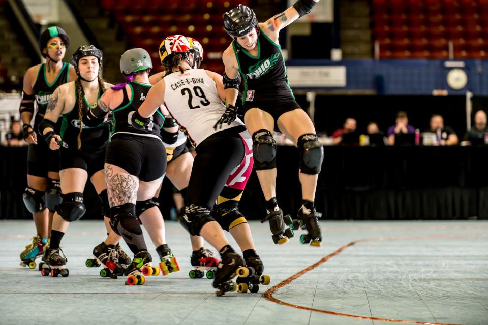 Ohio Roller Derby All-Star Bigg Rigg catches air during a game. After two sold-out home games in April, the skaters will face Team Ontario Roller Derby at the Ohio Expo Center on Saturday.