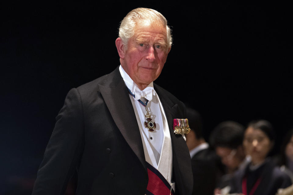 Britain's Prince Charles arrives at the Imperial Palace for the Court Banquets after the enthronement ceremony of Emperor Naruhito in Tokyo Tuesday, Oct. 22, 2019. (Pierre-Emmanuel Deletree/Pool Photo via AP)