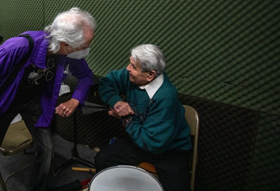 Doors' drummer John Densmore greets jazz drummer Steve Hideg.