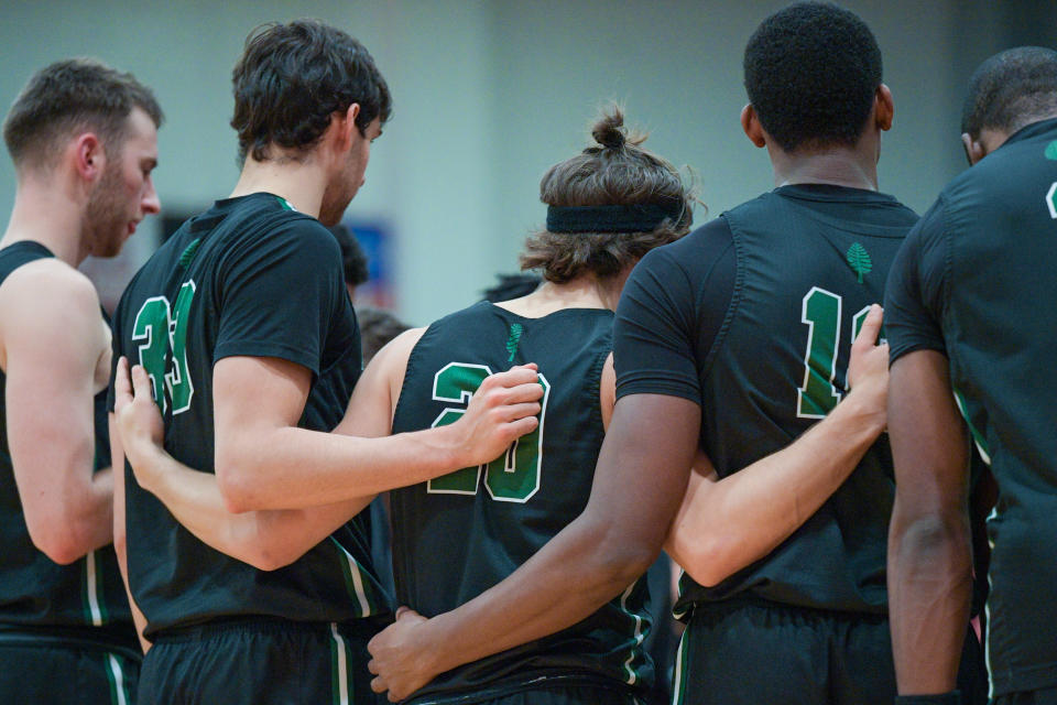 Dartmouth players during a timeout last season. (Erica Denhoff/Icon Sportswire via Getty Images)