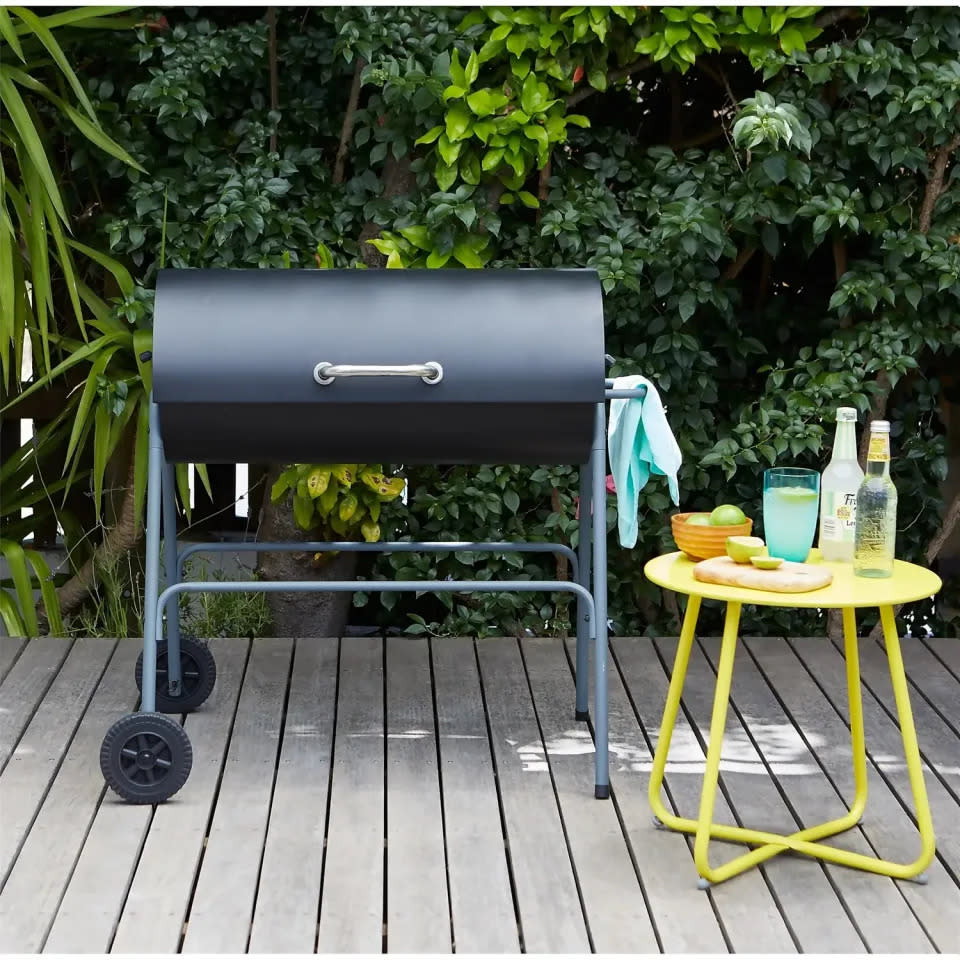 The simplistic charcoal BBQ has the ability to cook 20 burgers at one time. (Homebase)
