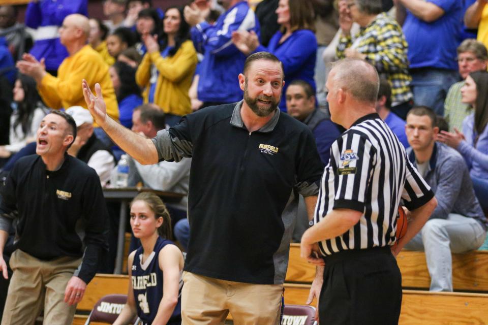 Fairfield head coach Brodie Garber talks to an official during the IHSAA Regional Finals Saturday, Feb. 11, 2023 at Jimtown High School.