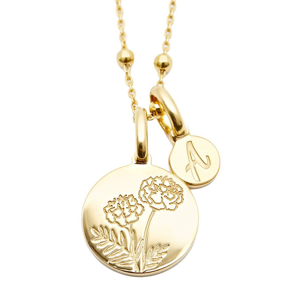 <p><a href="https://go.redirectingat.com?id=74968X1596630&url=https%3A%2F%2Frellery.com%2Fproducts%2Fdainty-marigold-necklace&sref=https%3A%2F%2F" rel="nofollow noopener" target="_blank" data-ylk="slk:Shop Now;elm:context_link;itc:0;sec:content-canvas" class="link rapid-noclick-resp">Shop Now</a></p><p>Marigold Initial Necklace</p><p>rellery.com</p><p>$155.00</p><span class="copyright">Rellery</span>