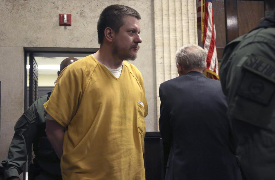 FILE - In this Jan. 18, 2019, file photo, former Chicago police Officer Jason Van Dyke is escorted into the courtroom for his sentencing hearing in Chicago, for the 2014 shooting of Laquan McDonald. Throughout the murder trial, prosecutors showed jurors the video seen countless times around the world of the white police officer killing a Black male. And when it was over, the jurors found the officer guilty of murder. That was in 2018. Now, as former Minneapolis Police Officer Derek Chauvin waits to be sentenced for killing George Floyd, it's worth remembering what happened in Chicago after a jury convicted a white police officer in the shooting death of 17-year-old Laquan McDonald: The judge didn't follow prosecutors' recommended 18-20 years behind bars and instead gave Van Dyke a more lenient sentence. (Antonio Perez/Chicago Tribune via AP, Pool, File)