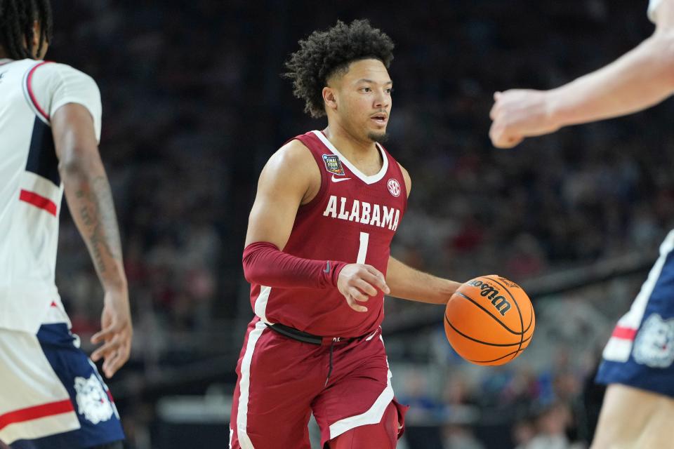 Apr 6, 2024; Glendale, AZ, USA; Alabama Crimson Tide guard Mark Sears (1) dribbles the ball against the Connecticut Huskies during the second half in the semifinals of the men's Final Four of the 2024 NCAA Tournament at State Farm Stadium. Mandatory Credit: Bob Donnan-USA TODAY Sports