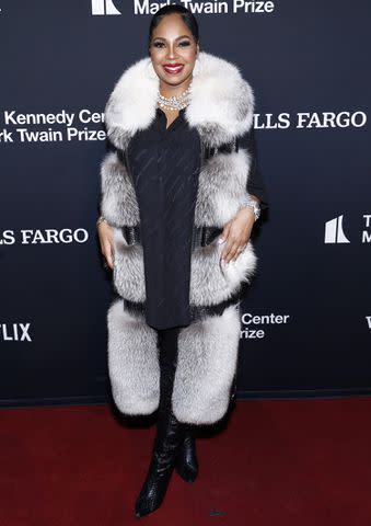 <p>Paul Morigi/Getty Images</p> Ashanti wore a long fur vest for the event