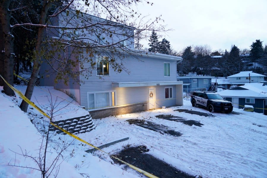 FILE – Bare spots are seen on Nov. 29, 2022, in the snowy parking lot in front of the home where four University of Idaho students were found dead on Nov. 13, in Moscow, Idaho. The home where University of Idaho students Ethan Chapin, Xana Kernodle, Madison Mogen and Kaylee Goncalves were killed is slated to be demolished starting Thursday, Dec. 28, 2023. (AP Photo/Ted S. Warren, File)