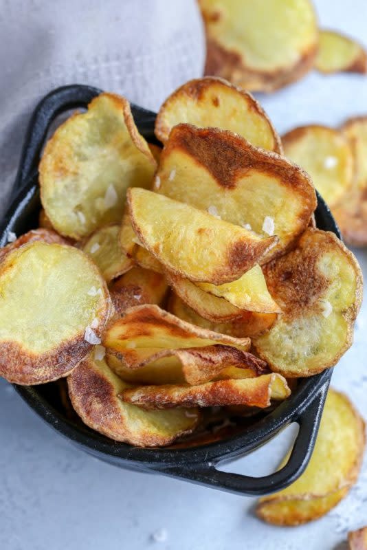 <p>Mom's Dish</p><p>This air fryer potato chips recipe is going to blow your mind! The chips are crunchy and so delicious, and you won’t feel guilty at all about enjoying a bowl or two.</p><p><strong>Get the recipe: <a href="https://momsdish.com/air-fryer-potato-chips-recipe" rel="nofollow noopener" target="_blank" data-ylk="slk:Air Fryer Potato Chips;elm:context_link;itc:0;sec:content-canvas" class="link ">Air Fryer Potato Chips</a></strong></p>