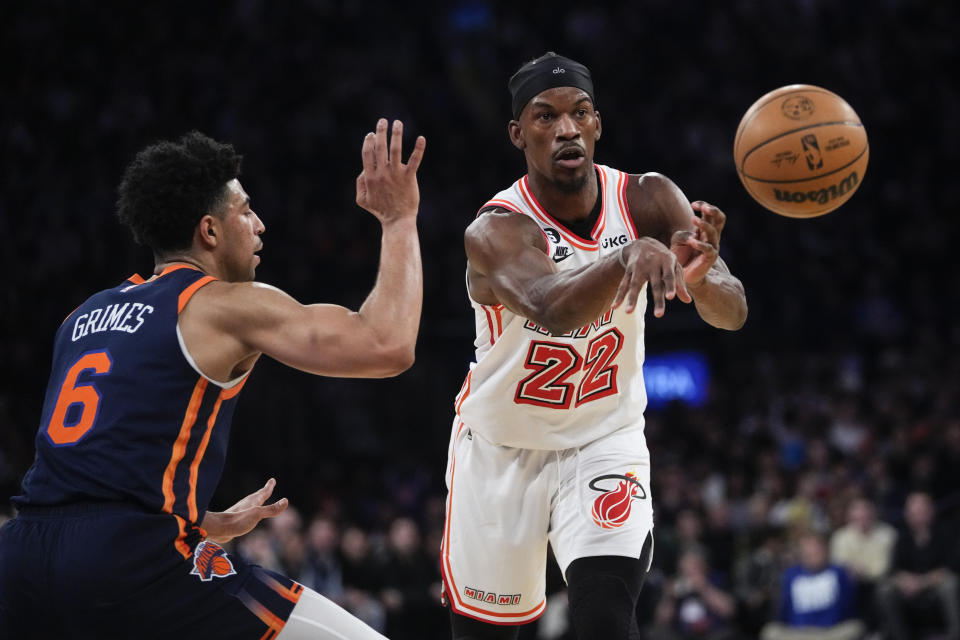 Miami Heat's Jimmy Butler (22) passes away from New York Knicks' Quentin Grimes (6) during the first half of an NBA basketball game, Thursday, Feb. 2, 2023, in New York. (AP Photo/Frank Franklin II)