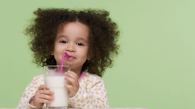 little girl drinking milk