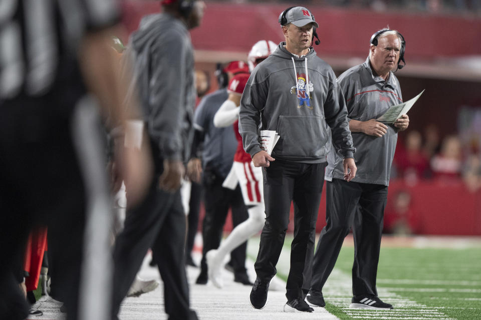 Nebraska head coach Scott Frost, wearing hat, and offensive coordinator Mark Whipple, right, look on against Georgia Southern during an NCAA college football game Saturday, Sept. 10, 2022, in Lincoln, Neb. (Noah Riffe/Lincoln Journal Star via AP)