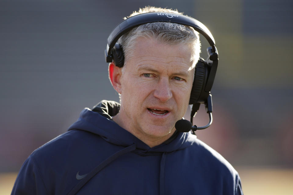 Toledo coach Jason Candle walks the sideline during the second half of an NCAA college football game against Central Michigan, Friday, Nov. 24, 2023, in Mount Pleasant, Mich. (AP Photo/Al Goldis)