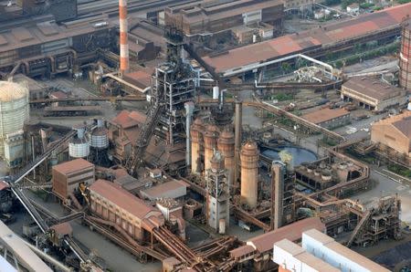 FILE PHOTO - An aerial view shows Kobe Steel's Kobe Works steel plant in Kobe, western Japan, in this photo taken by Kyodo May 25, 2013. Picture taken May 25, 2013. Mandatory credit Kyodo/via REUTERS