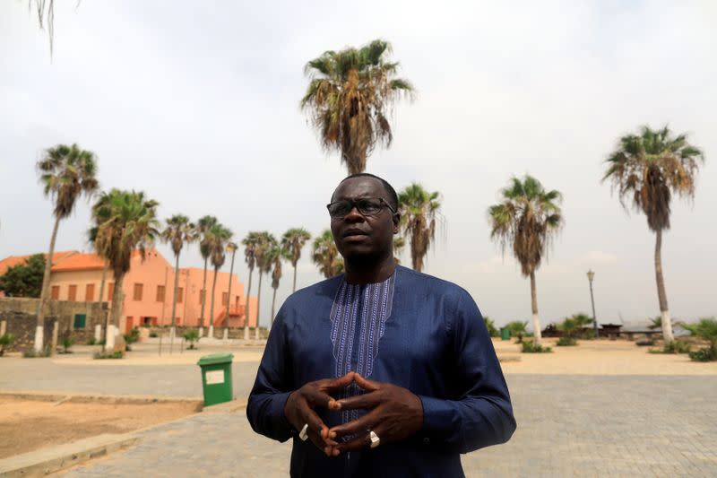 Doudou Dia speaks during an interview at Europe Square on Goree Island