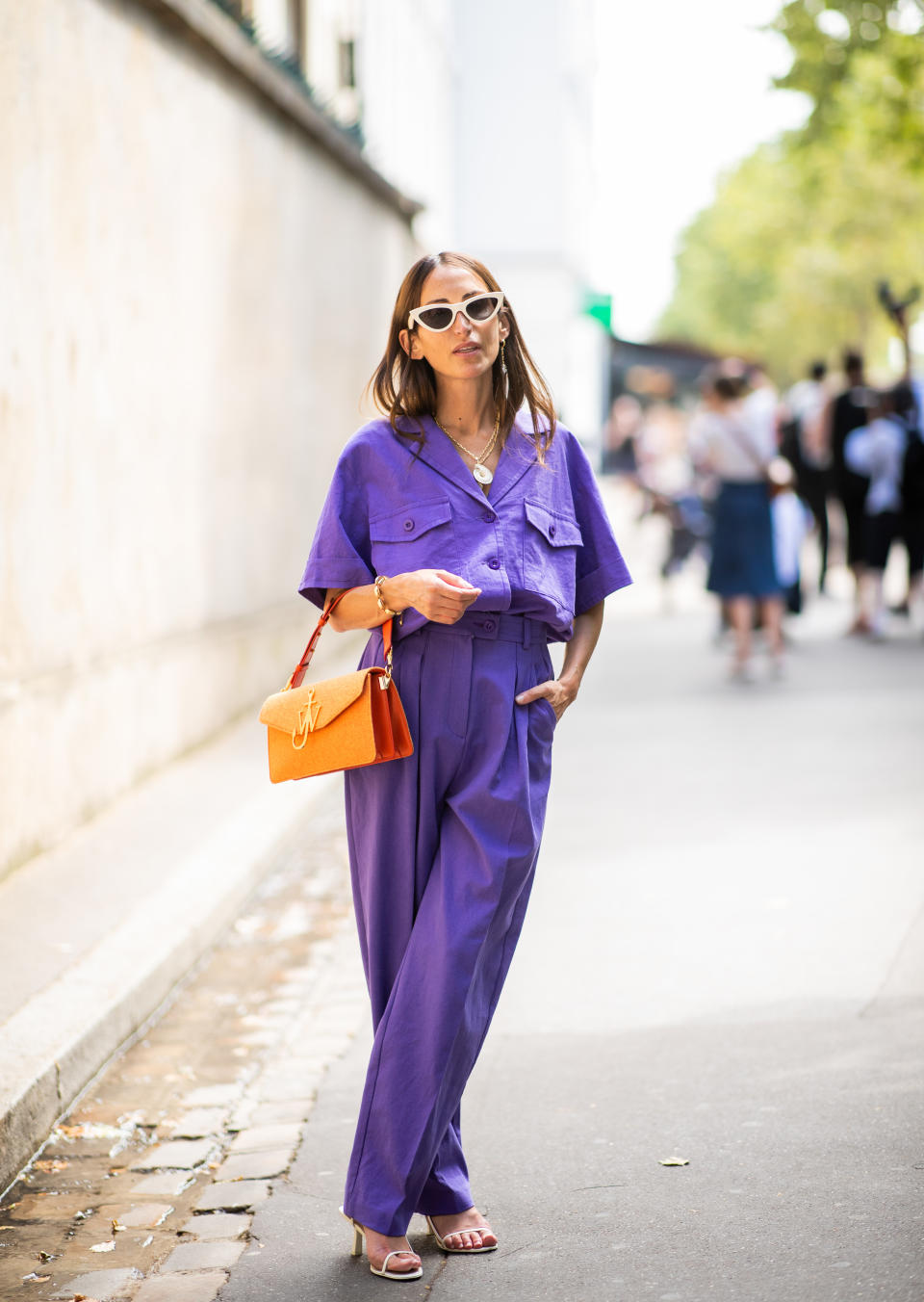 PARIS, FRANCE - JULY 02: A guest wearing purple pants and button shirt seen outside Dior on day two during Paris Fashion Week Haute Couture FW18 on July 2, 2018 in Paris, France. (Photo by Christian Vierig/Getty Images)