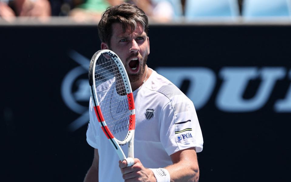 Britain's Cameron Norrie celebrates after victory against Peru's Juan Pablo Varillas during their men's singles match on day three of the Australian Open tennis tournament in Melbourne on January 16, 2024