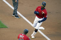 Minnesota Twins Byron Buxton rounds third base on a two-run home run off Texas Rangers' pitcher Kyle Gibson in the first inning of a baseball game, Tuesday, May 4, 2021, in Minneapolis. (AP Photo/Jim Mone)