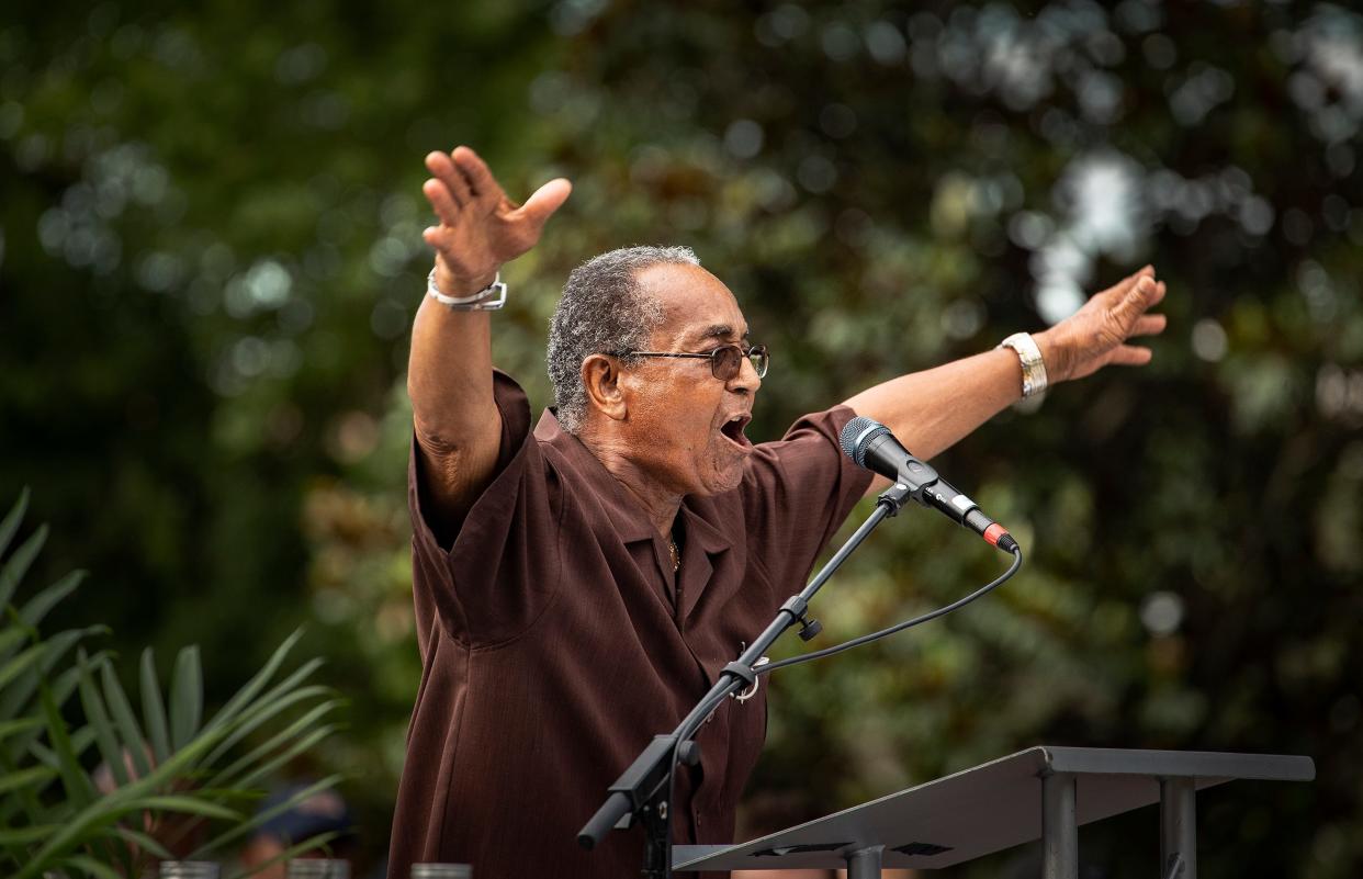 The Rev. Alex Harper prays with a crowd gathered for the One Heart Community Faith Rally in Munn Park in Lakeland in 2020. Harper died Jan. 22 at age 88.