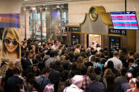 <p>Passengers rush toward a New Jersey Transit trains platform during rush hour at Penn Station, September 29, 2016 in New York City. (Drew Angerer/Getty Images) </p>