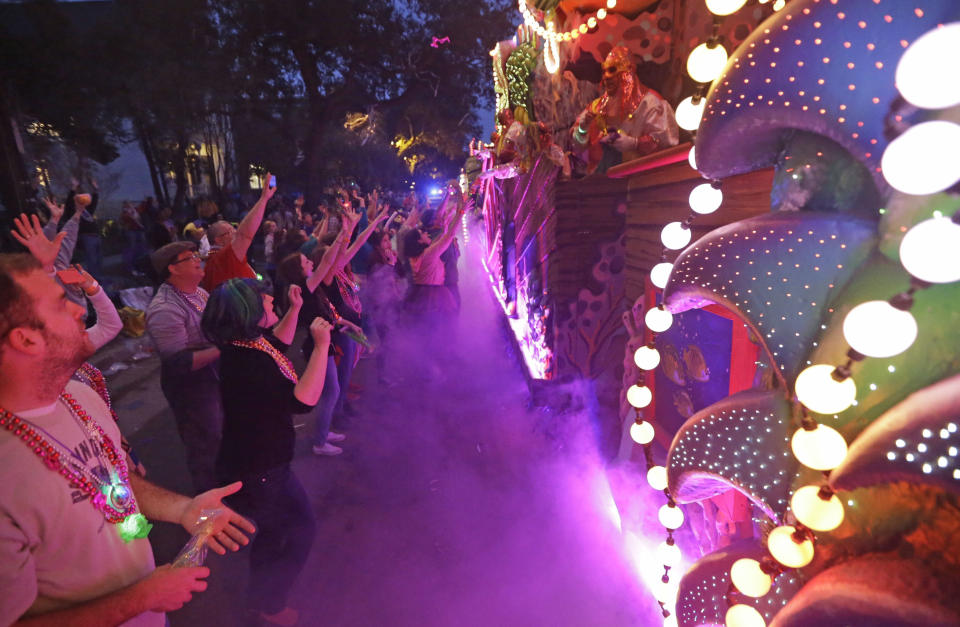 The Krewe of Proteus Mardi Gras parade roles down Napoleon Aveune in New Orleans, Monday, Feb. 16, 2015. 