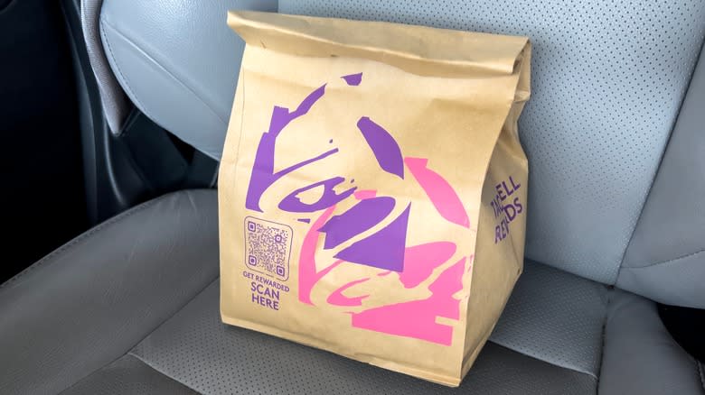 Taco Bell bag on carseat