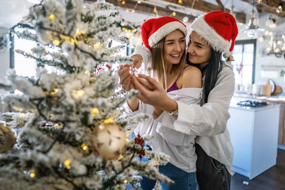 <p>Getty</p> Couple celebrates Christmas together.