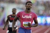 Fred Kerley, of the United States, wins a heat in the men's 100-meter run at the World Athletics Championships Friday, July 15, 2022, in Eugene, Ore. (AP Photo/Ashley Landis)