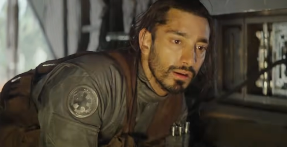 Riz Ahmed as Body looking scared in Rogue One