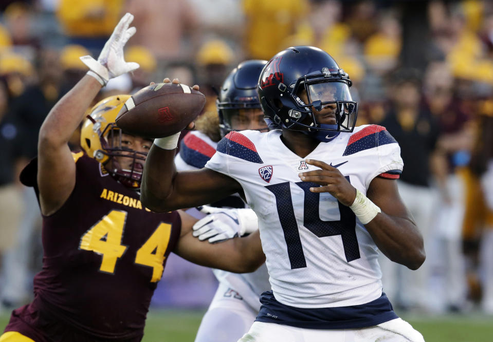 Arizona quarterback Khalil Tate (14) does not want to ever play in a triple-option based offense. (AP Photo/Rick Scuteri, File)
