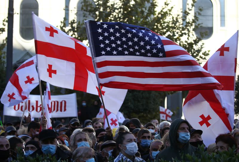 Opposition supporters protest against results of a parliamentary election