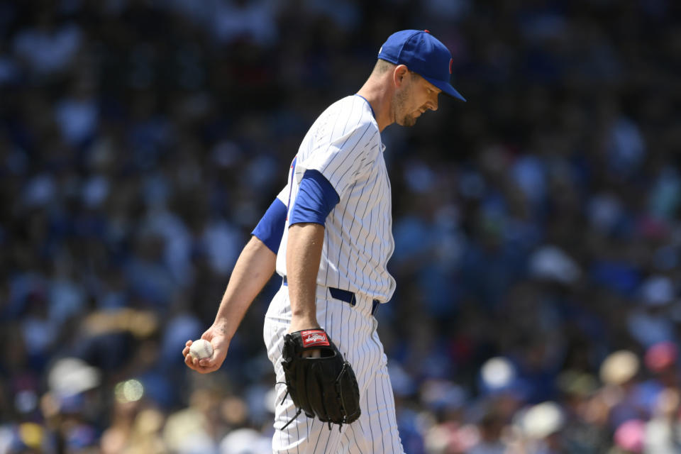 Chicago Cubs relief pitcher Drew Smyly reacts after giving up a solo home run to Los Angeles Angels' Jo Adell during the fifth inning of a baseball game Saturday, July 6, 2024, in Chicago. (AP Photo/Paul Beaty)