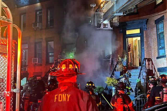 <p>FDNY/Instagram</p> A Crown Heights brownstone photographed up in flames while firefighters attempt to control the blaze