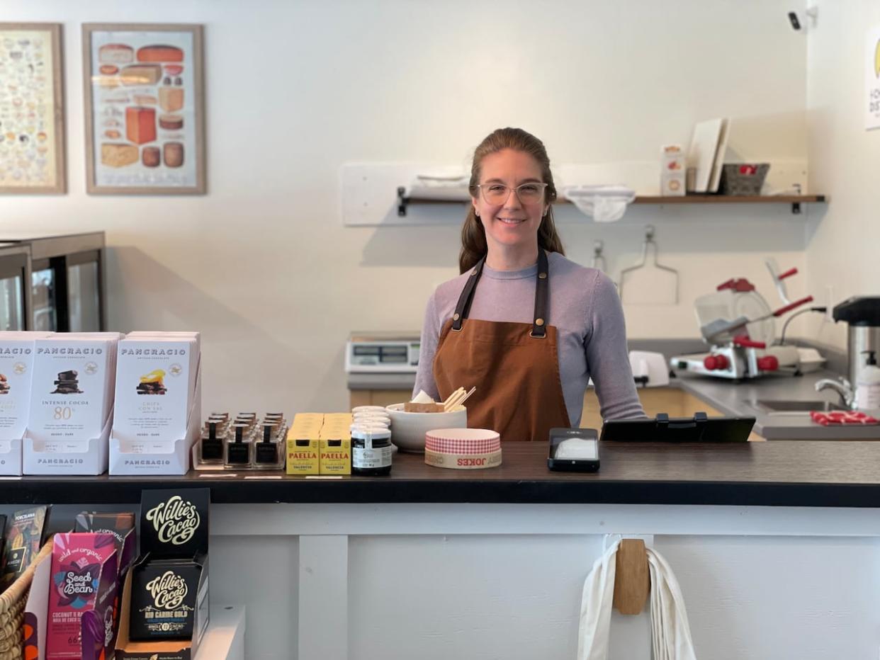Emily Field is co-owner of the Cheese Exchange, a local store in the Chatham area of Miramichi. She's hopeful a city bylaw on Sunday shopping will change, allowing her to set her own business hours. (Alexandre Silberman/CBC - image credit)
