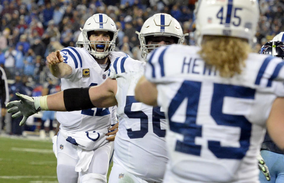 Indianapolis Colts quarterback Andrew Luck, left, runs to celebrate with tight end Ryan Hewitt (45) after they teamed up on a 1-yard touchdown pass against the Tennessee Titans in the second half of an NFL football game Sunday, Dec. 30, 2018, in Nashville, Tenn. (AP Photo/Mark Zaleski)