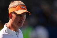 FILE PHOTO: Oct 22, 2017; Carson, CA, USA; Denver Broncos offensive coordinator Mike McCoy looks on from the field before the game against the Los Angeles Chargers at StubHub Center. Orlando Ramirez-USA TODAY Sports