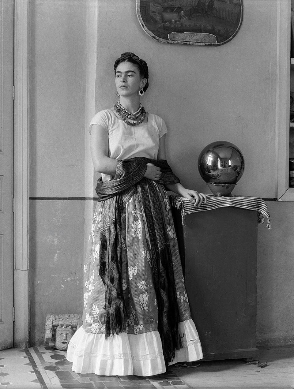 Kahlo with a crystal sphere in Coyoacán, Mexico, circa 1938.