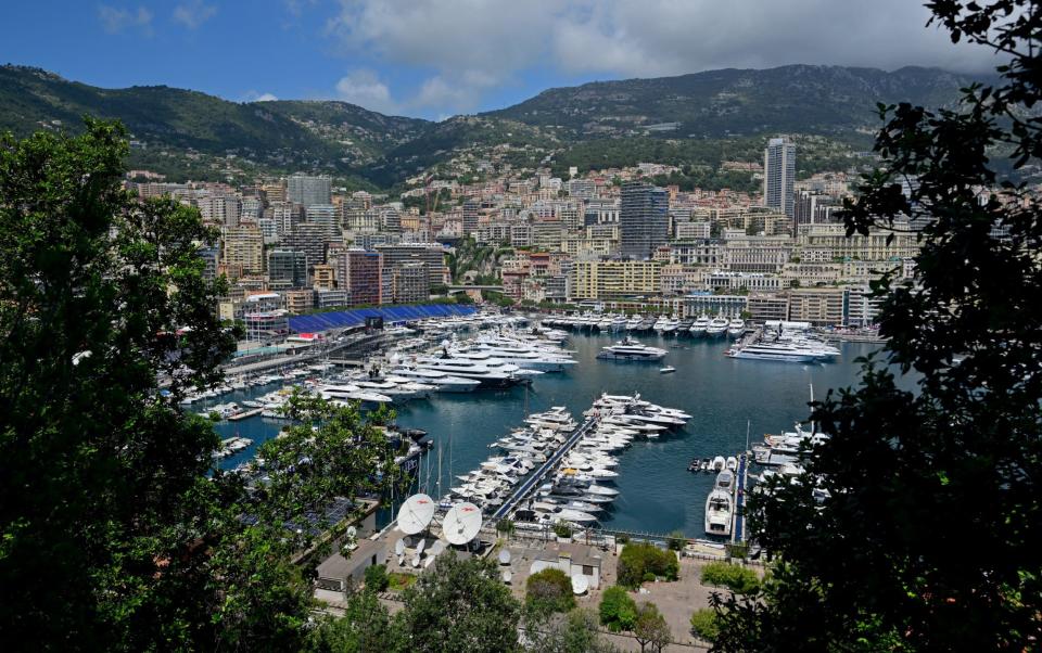 Yachts docked at the Monte Carlo harbour in front of the stands of the Circuit de Monaco