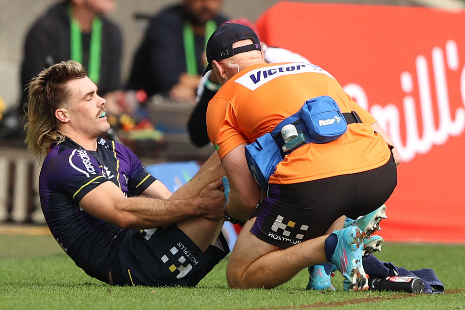 Ryan Papenhuyzen (pictured) is hurt during the Storm's round nine NRL match.