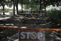 Benches and tables are sealed off for the social distancing measures as a precaution against the coronavirus in Seoul, South Korea, Thursday, Sept. 24, 2020. (AP Photo/Lee Jin-man)