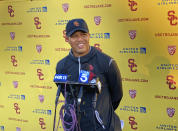 Southern California interim head football coach Donte Williams smiles while answering questions after practice on Tuesday, Sept. 14, 2021 in Los Angeles. Williams became the first Black head coach in Trojans history when he replaced the fired Clay Helton. (AP Photo/Greg Beacham)