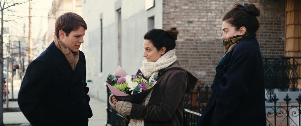 Jake Lacy, Jenny Slate and Gaby Hoffmann standing together on the street in Obvious Child