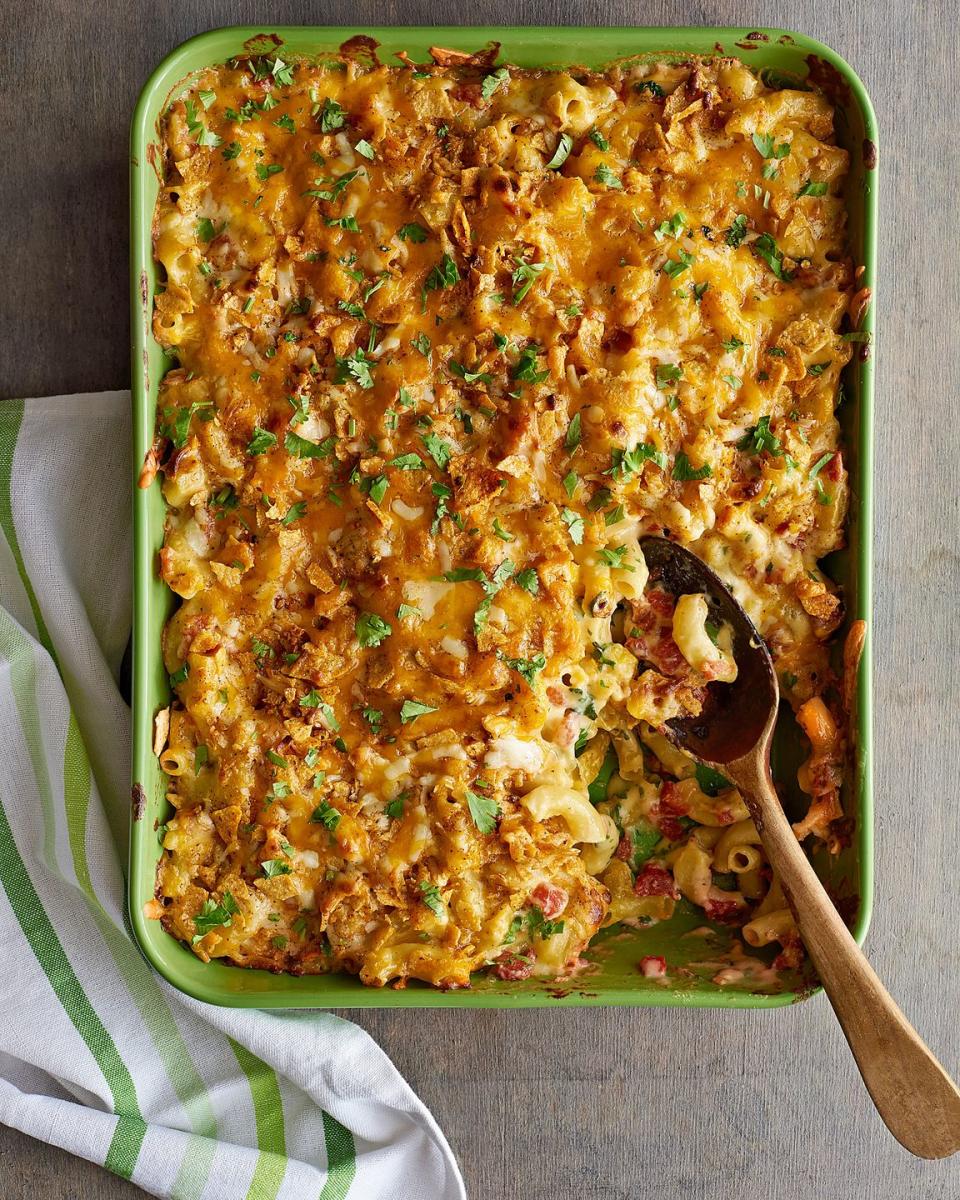 queso mac and cheese in a green baking dish