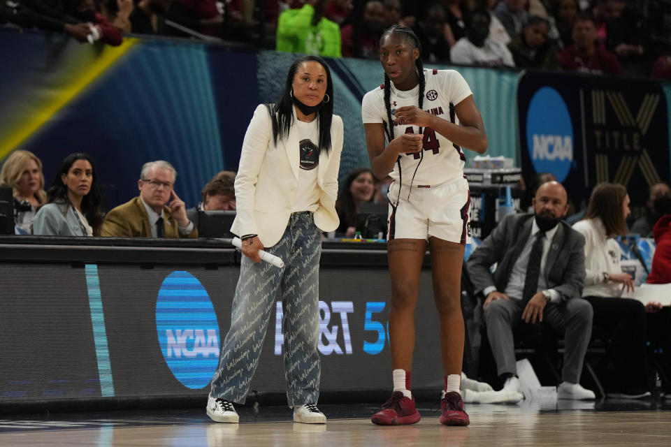 South Carolina coach Dawn Staley talks to guard Saniya Rivers in the second half Friday against Louisville.